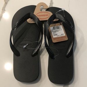 Never worn Havaianas black flip flops